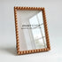 Gold beaded photo frame with &