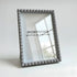 Gray textured picture frame with &